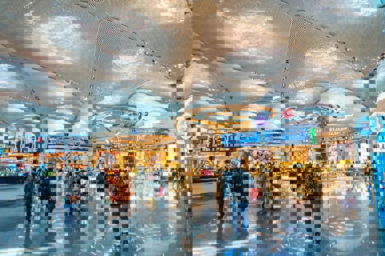 Unclaimed Luggage Auction Draws Crowds at Airport Terminal